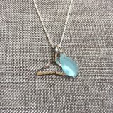 Wyland’s Small Open Whale Tail Necklace + Recycled Blue Glass Bead